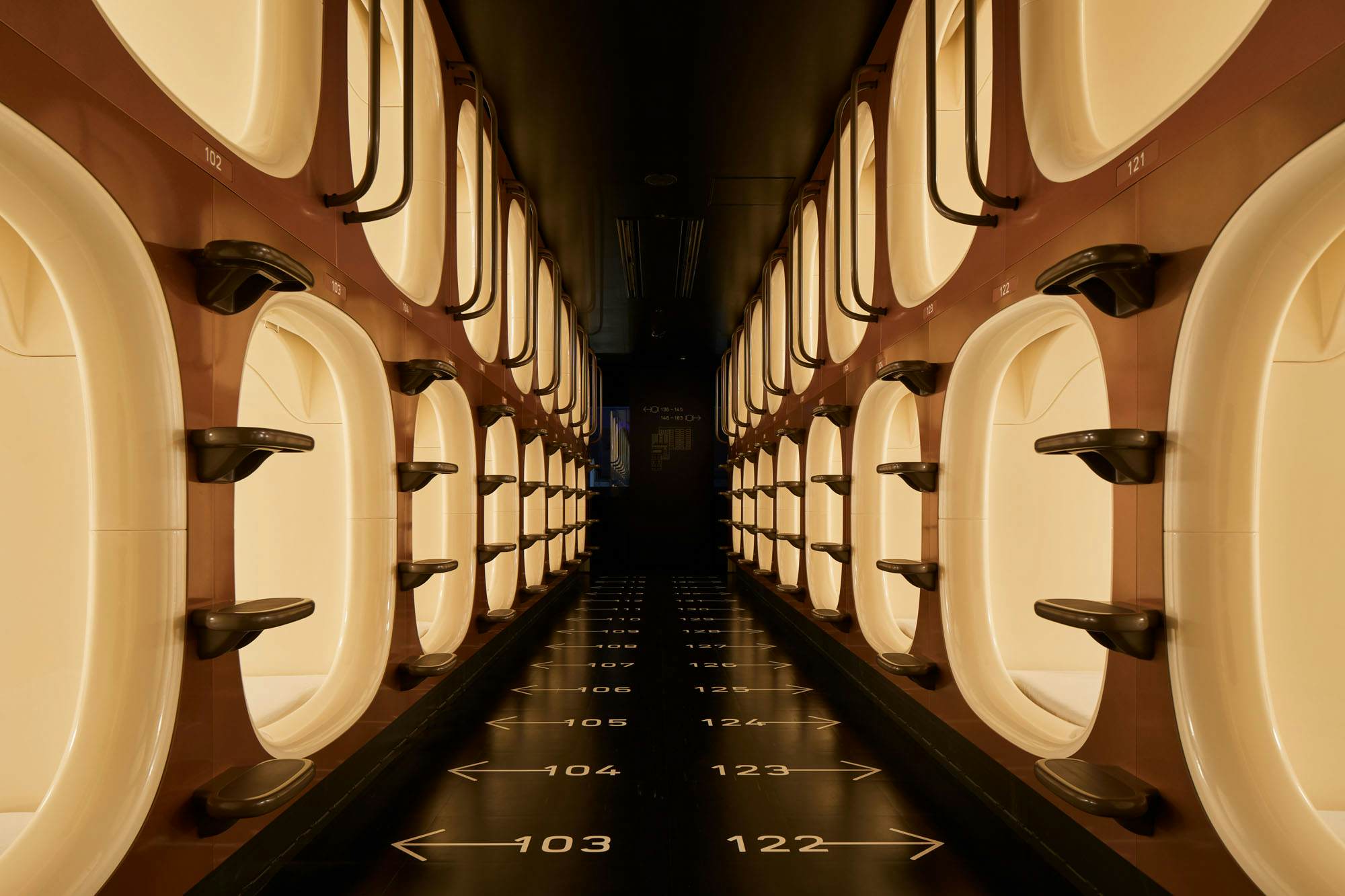 Osaka’s futuristic new capsule hotel features a relaxation lounge for
